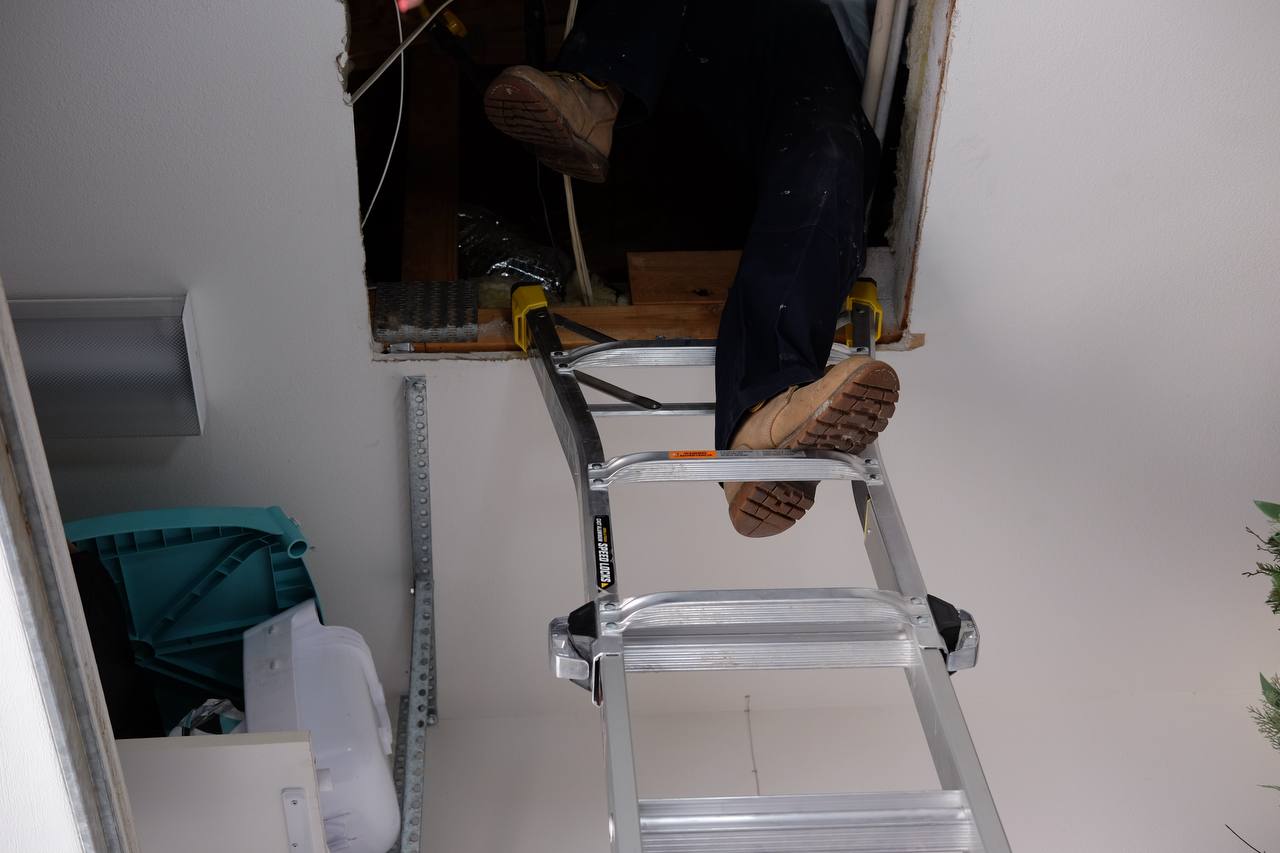 Tight attic access hatch — full system retrofit through a small opening
