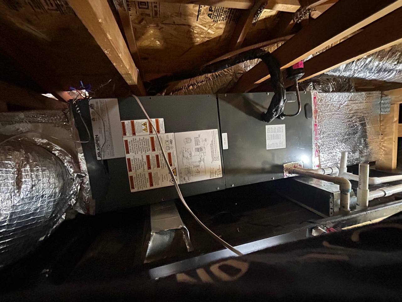 New Aspen air handler installed in tight attic space — horizontal configuration with ductwork connected