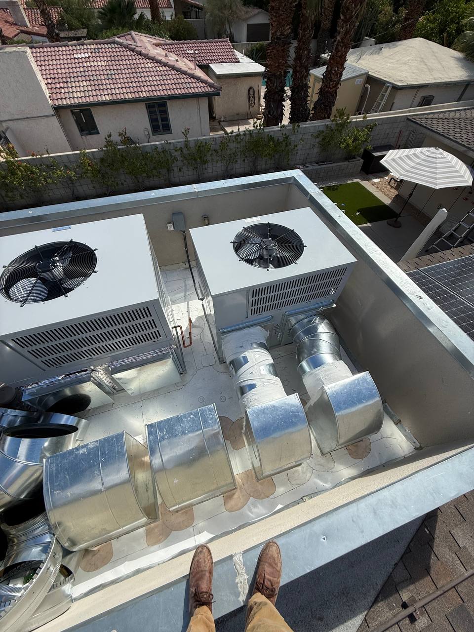 Two Bosch IDP package units installed on new PVC rooftop — Palm Springs HVAC retrofit