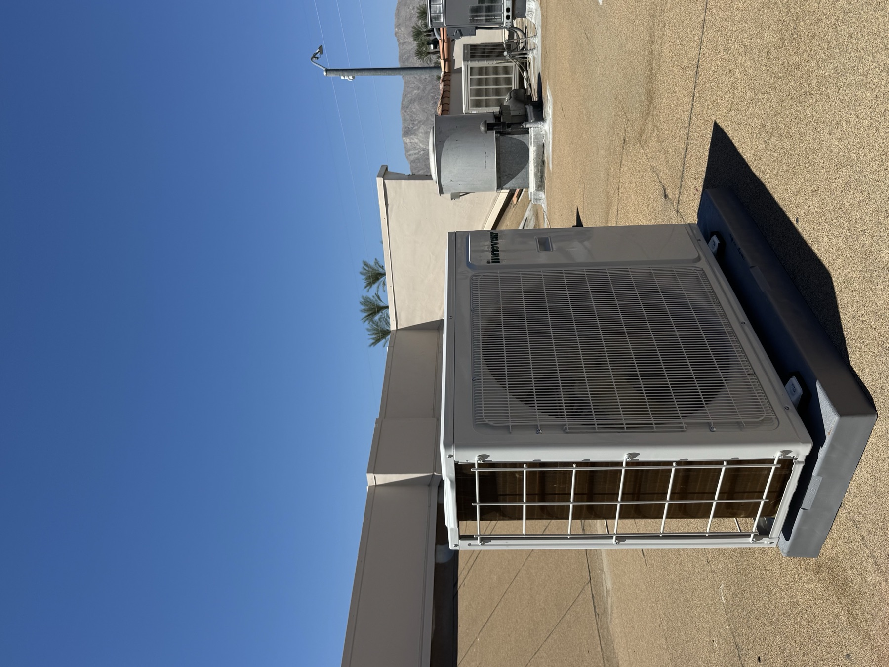 Completed 36,000 BTU outdoor mini-split condenser on the restaurant roof